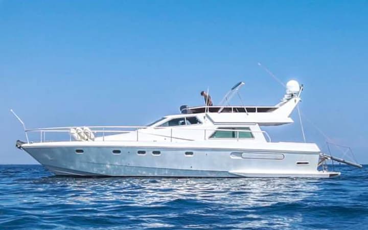 52 Ferretti luxury charter yacht - Ornos Beach, Ornos, Greece